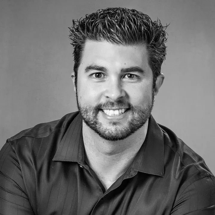 Black-and-white headshot of Joel Polanco